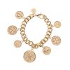 Gold chunky bracelet with strong, lucky, love, and forever coin charms