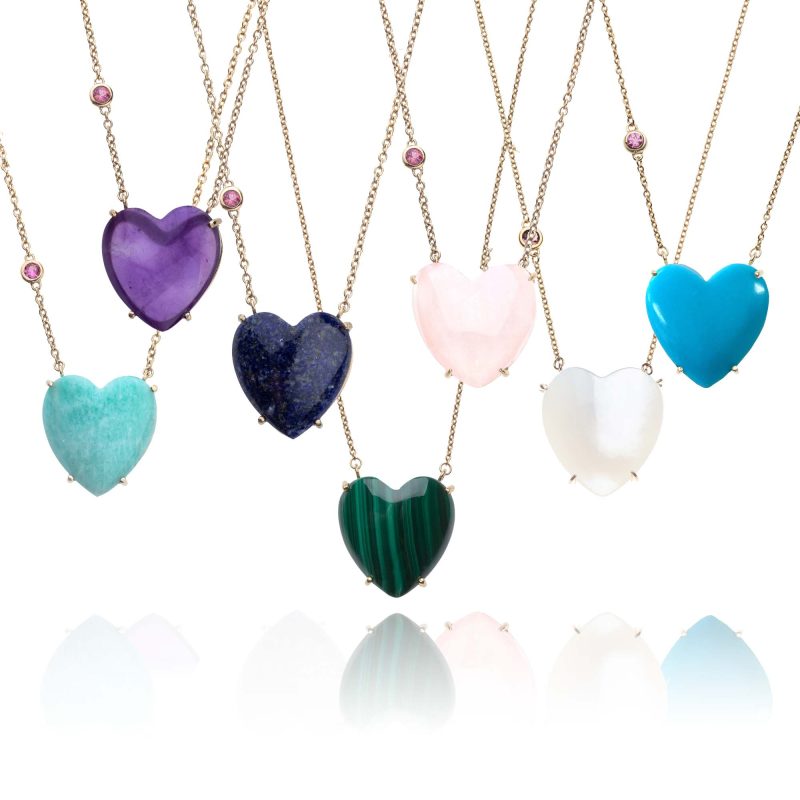 Carved heart necklaces in amazonite, amethyst, lapis, malachite, mother of pearl, rose quartz, and turquoise with pink tourmaline accent on chain