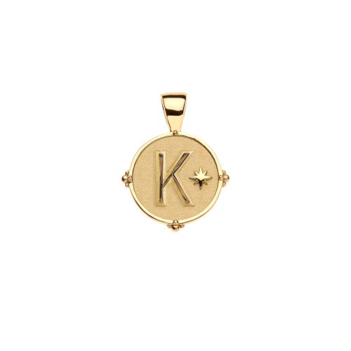 Gold letter K coin pendant with star detail