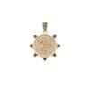 Gold coin pendant with snake design and the french phrase "Gardez bien" with smoky topaz accents on the border and emerald stones on the bail