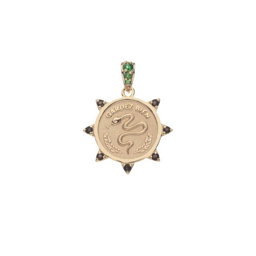 Gold coin pendant with snake design and the french phrase 