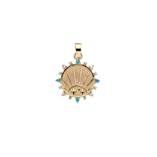 Gold coin pendant with rising sun design and aquamarine, sky blue topaz, and white topaz stones on border